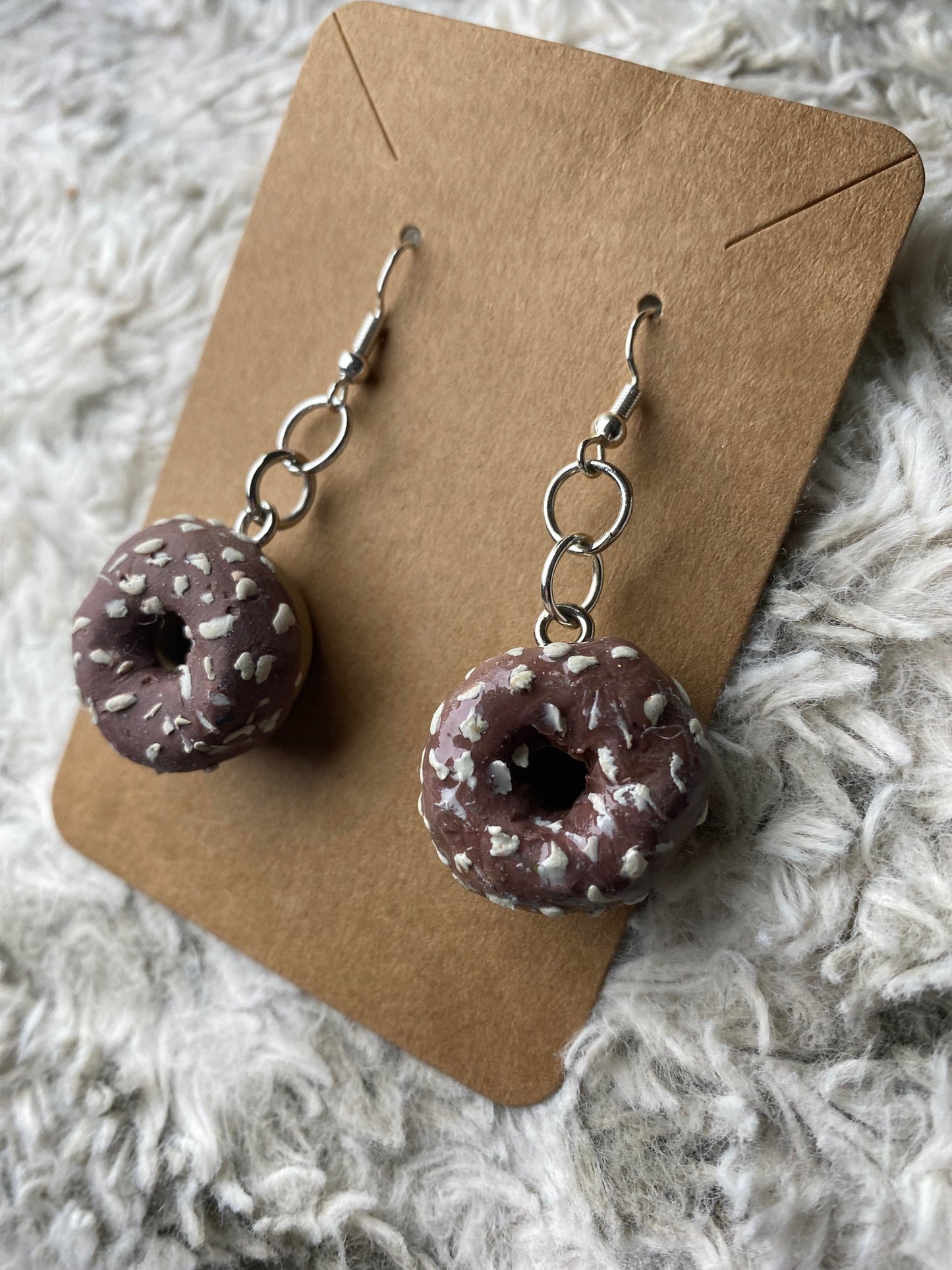 Donuts with Chocolate Icing and White Sprinkles