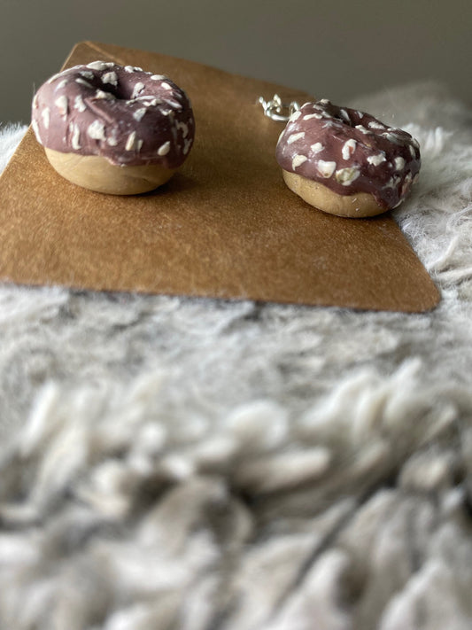 Donuts with Chocolate Icing and White Sprinkles