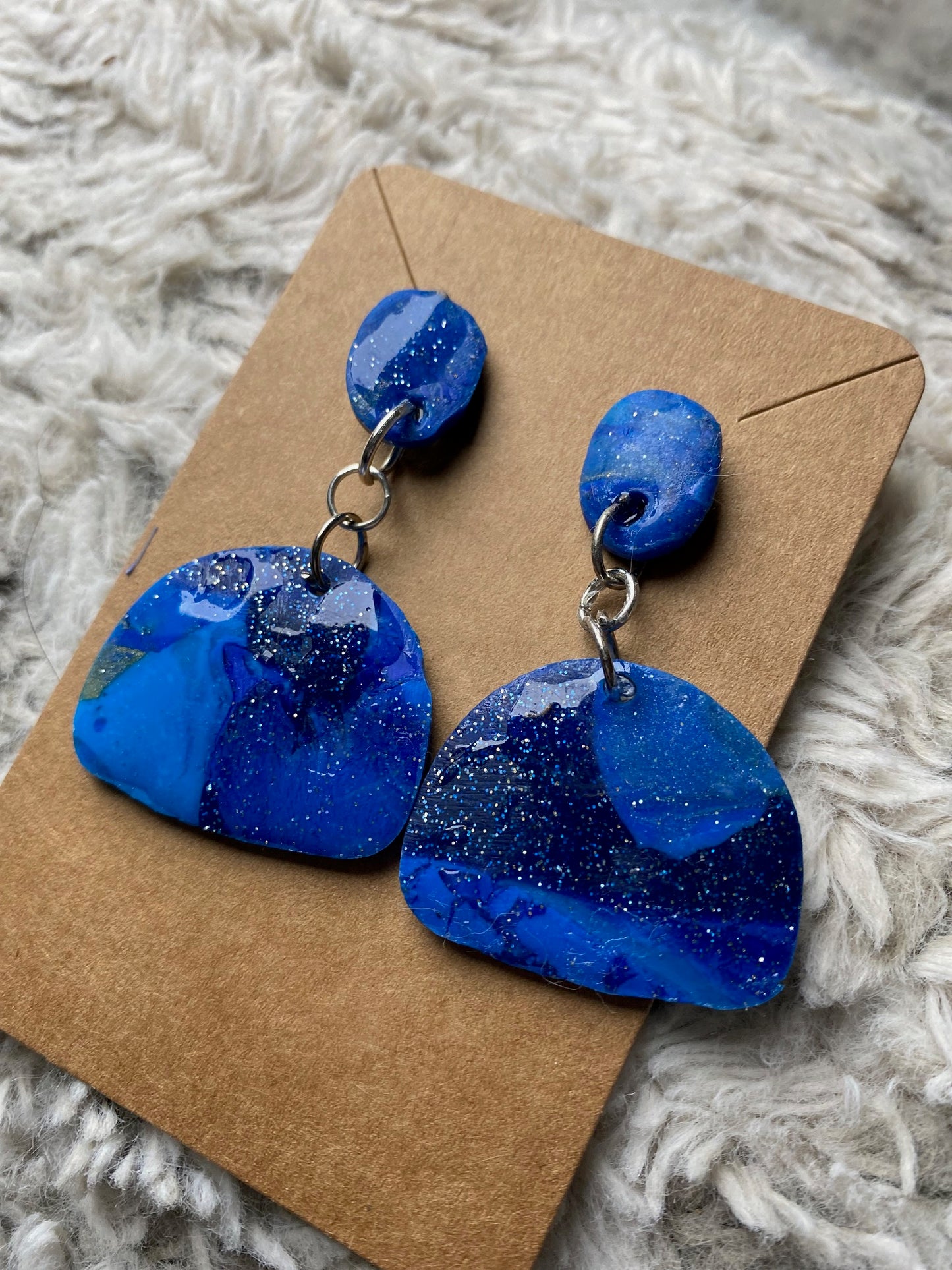 Blue Dangling Arch Earrings